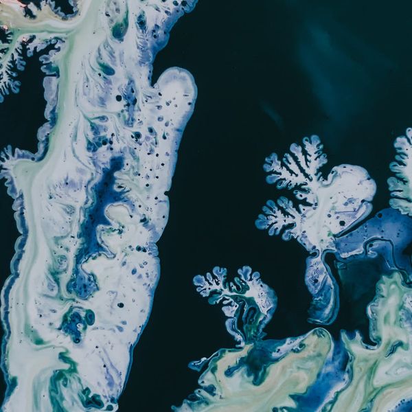 Abstract light painting suggesting fluid, continuous movement.